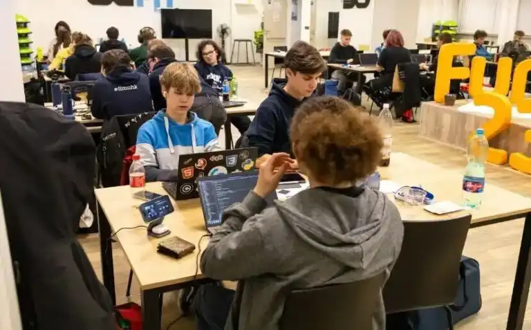 Photo of our team working on our hackathon project